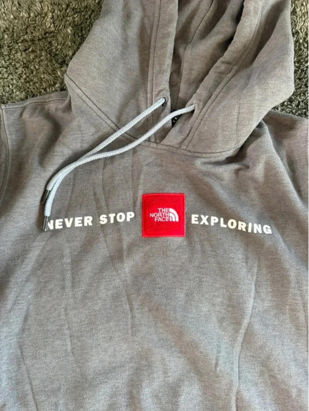 The North Face Men's Medium Gray Hoodie - Never Stop Exploring